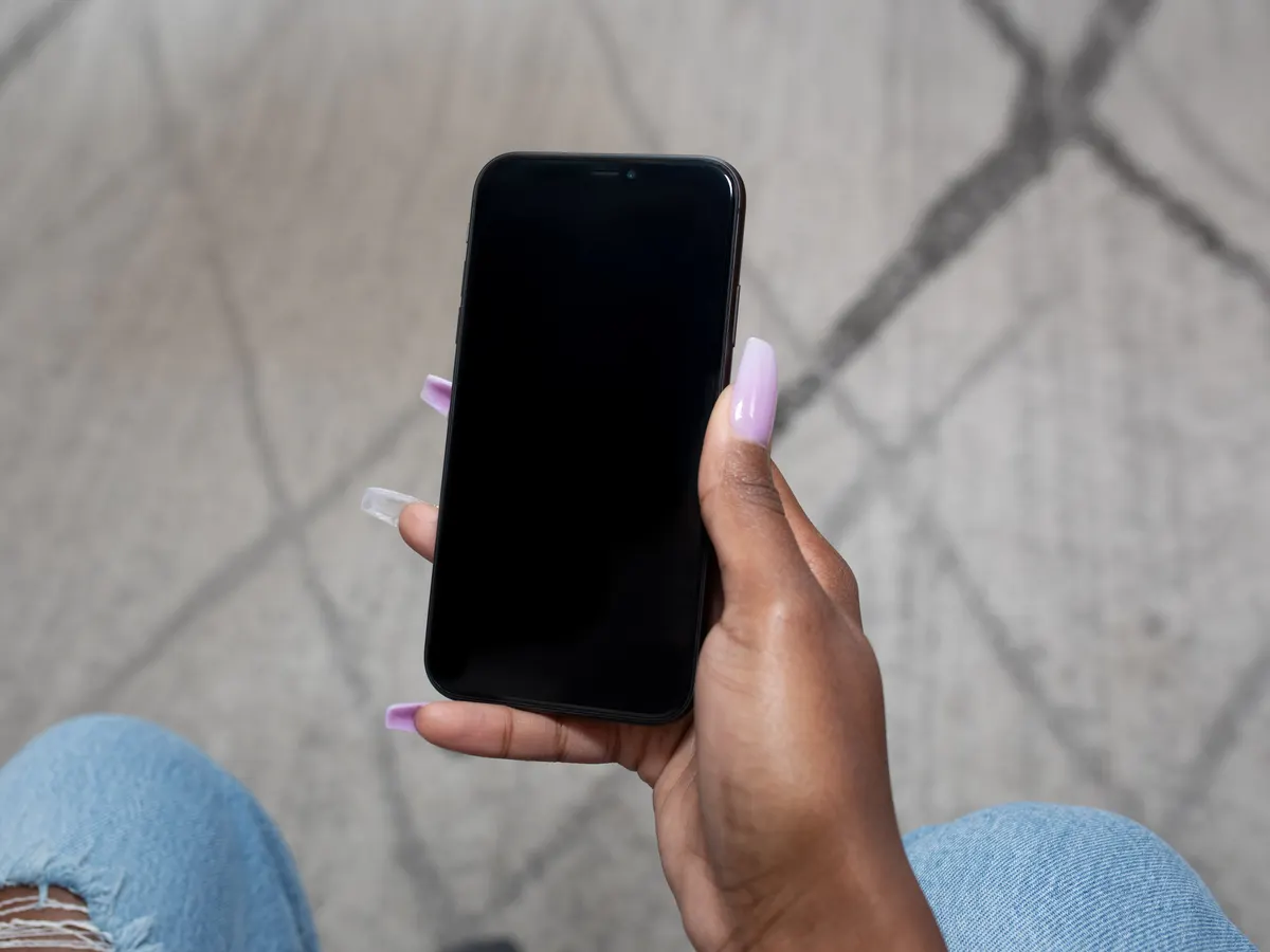 Hand holding a smartphone